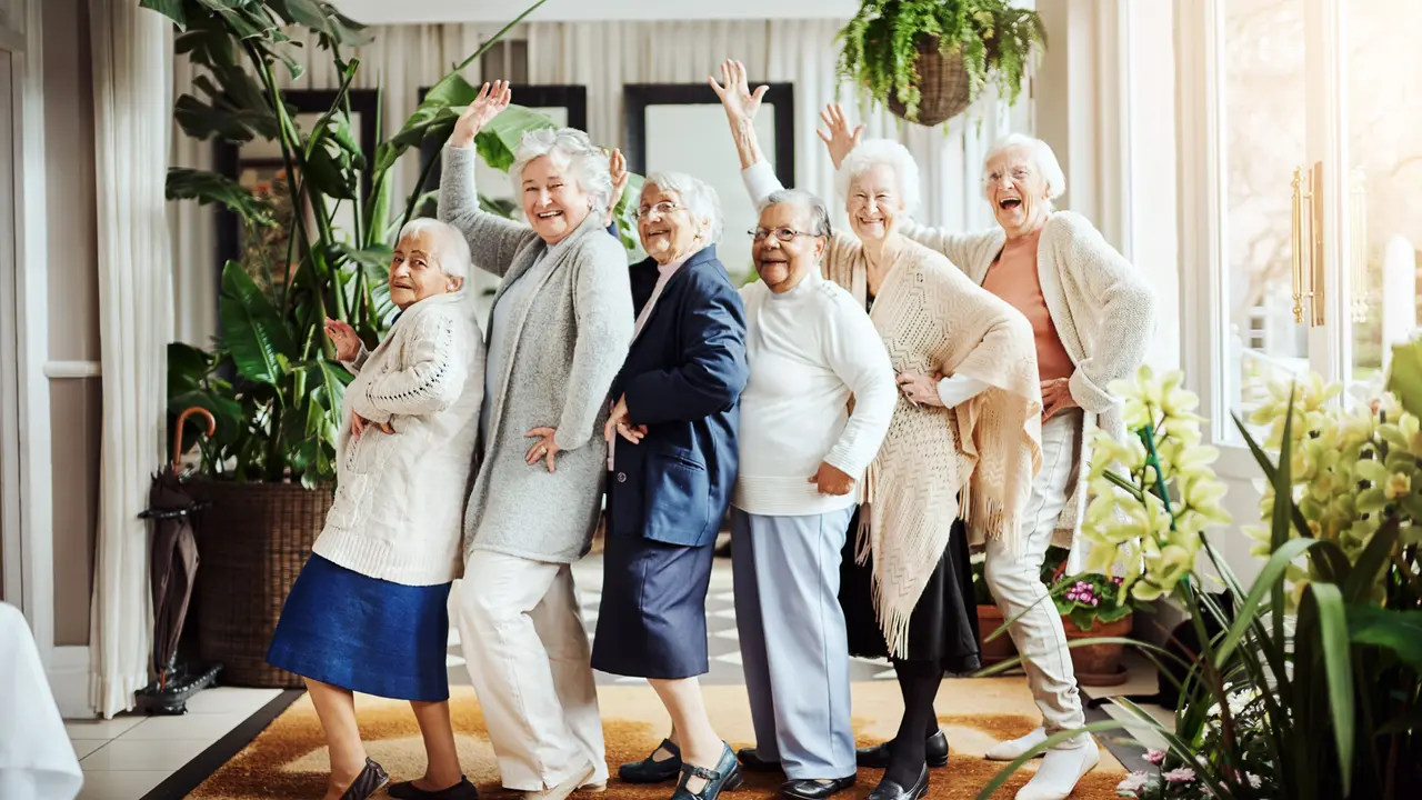 Portrait of a group of happy senior women having fun together at a retirement home.