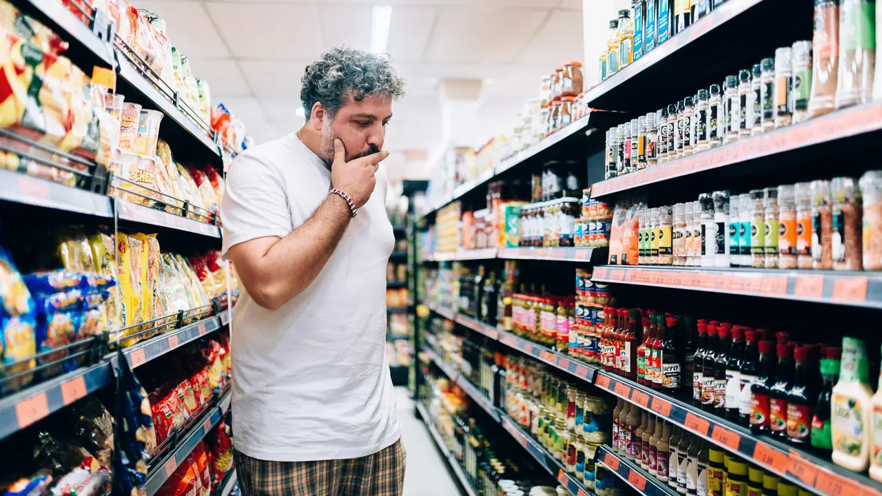 Man shopping at market grocery store.
