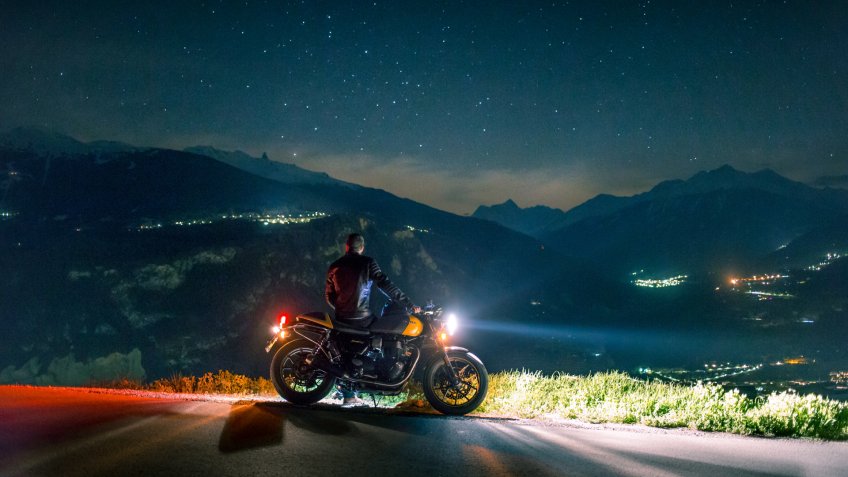 motorcycle driver at night.