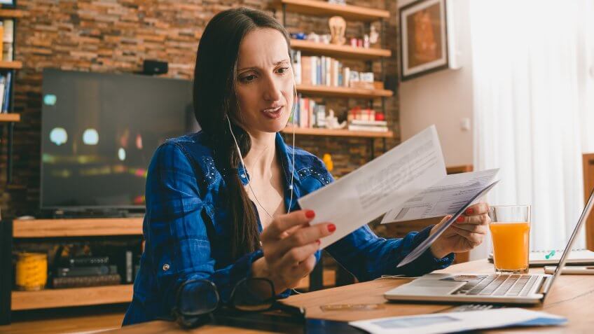 Woman with overdue bills