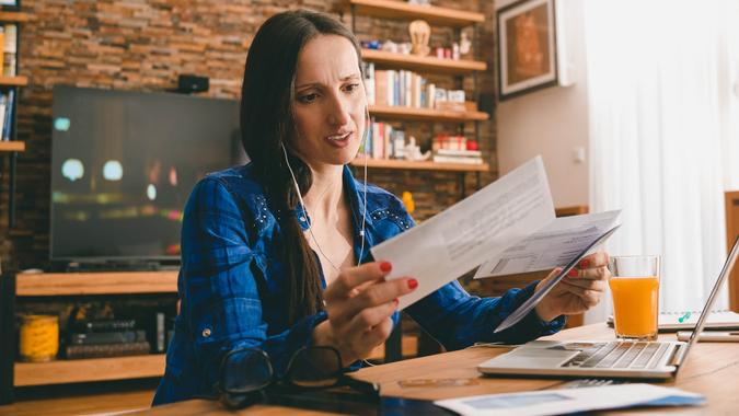 Woman with overdue bills