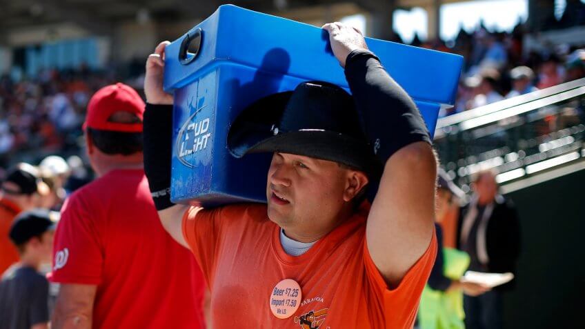 A beer vendor works the stands at Ed Smith Stadium during an exhibition spring training baseball game between the Baltimore Orioles and the Boston Red Sox at Ed Smith Stadium in Sarasota, FlaRed Sox Orioles Spring Baseball, Sarasota, USA.