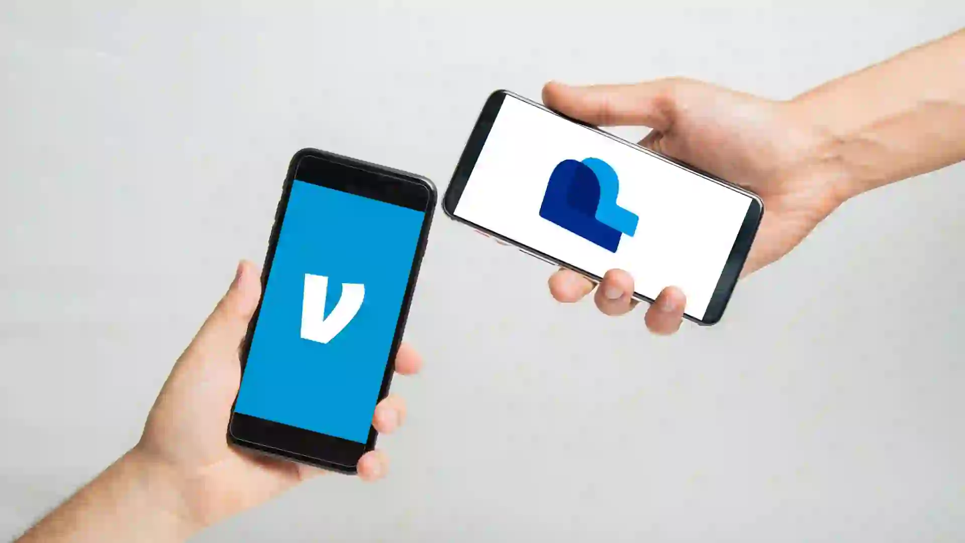 Venmo vs Paypal smartphone apps on display screens