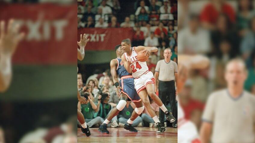 The Chicago Bulls' Bill Cartwright (24) tries to drive around the New York Knicks' Patrick Ewing during the first quarter of Game of 4 of the Eastern Conference semifinals, in ChicagoKnicks vs Bulls Basketball, Chicago, USA.