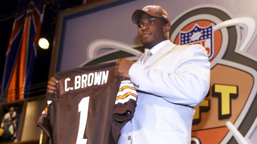 Mandatory Credit: Photo by Ed Betz/AP/Shutterstock (6032812a)BROWN Defensive end Courtney Brown, from Penn State, holds up a Cleveland Browns jersey after being selected by the Browns as the No.
