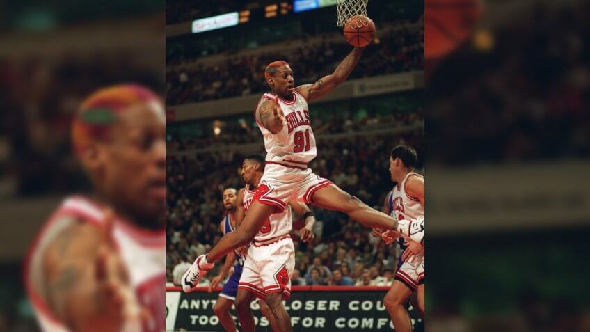 RODMAN Chicago Bulls' Dennis Rodman grabs a rebound during the second quarter of the Bulls' 87-82 defeat of the Charlotte Hornets, in Chicago.