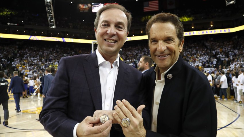 Mandatory Credit: Photo by John G Mabanglo/EPA-EFE/Shutterstock (9141257c)Joe Lacob and Peter GuberHouston Rockets at Golden State Warriors, Oakland, USA - 17 Oct 2017Golden State Warriors owners Joe Lacob (L) and Peter Guber (R) show off their NBA Championship rings before the NBA basketball game between the Houston Rockets and the Golden State Warriors at Oracle Arena in Oakland, California, USA, 17 October 2017.