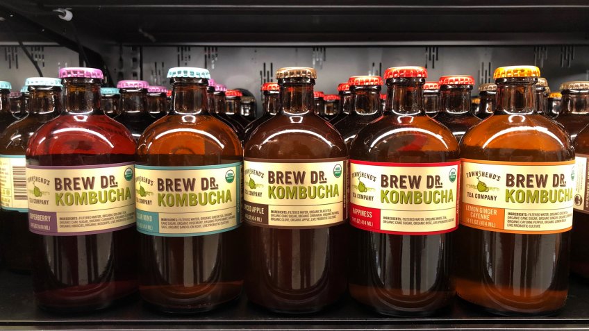 Alameda, CA - December 31, 2017: Grocery store shelf with bottles of Brew DR Kombucha in various flavors.