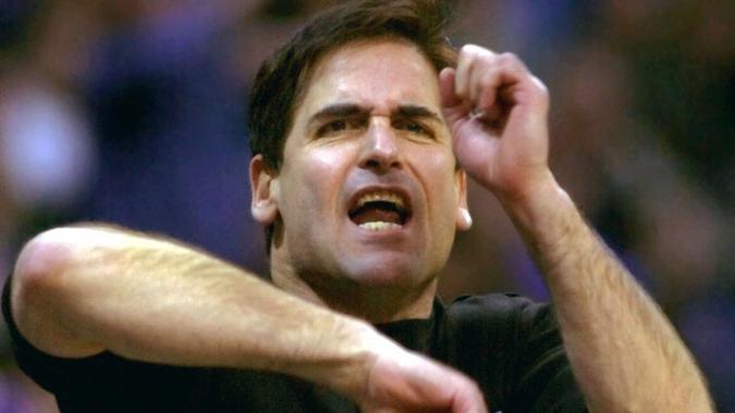 Mandatory Credit: Photo by Bill Janscha/AP/Shutterstock (6470243a)CUBAN Dallas Mavericks owner Mark Cuban yells and signals a traveling penalty during the fourth quarter of the Kings' 116-105 win in DallasKINGS MAVERICKS, DALLAS, USA.