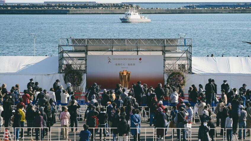 Mandatory Credit: Photo by Eugene Hoshiko/AP/Shutterstock (10593061s)Visitors queue to see the Olympic Flame during a flame display ceremony in Iwaki, Fukushima Prefecture, northern Japan, .