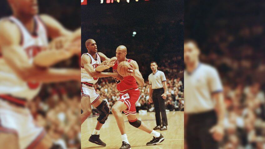 Chicago Bulls' Scott Williams, right, drives on New York Knicks' Charles Smith during the second half at Madison Square Garden in New York, on Wednesday, night, .