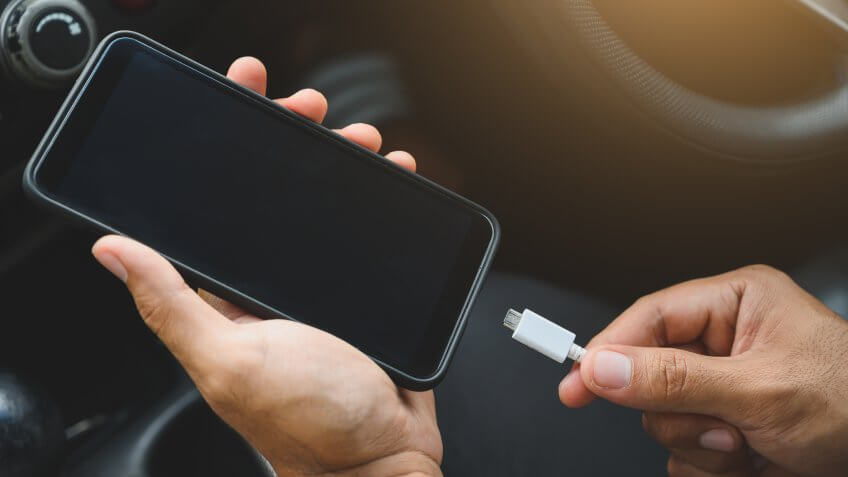 Charging smart phones in the car.