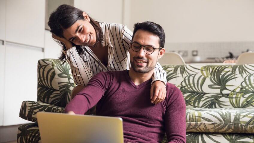 Young couple having fun at home.