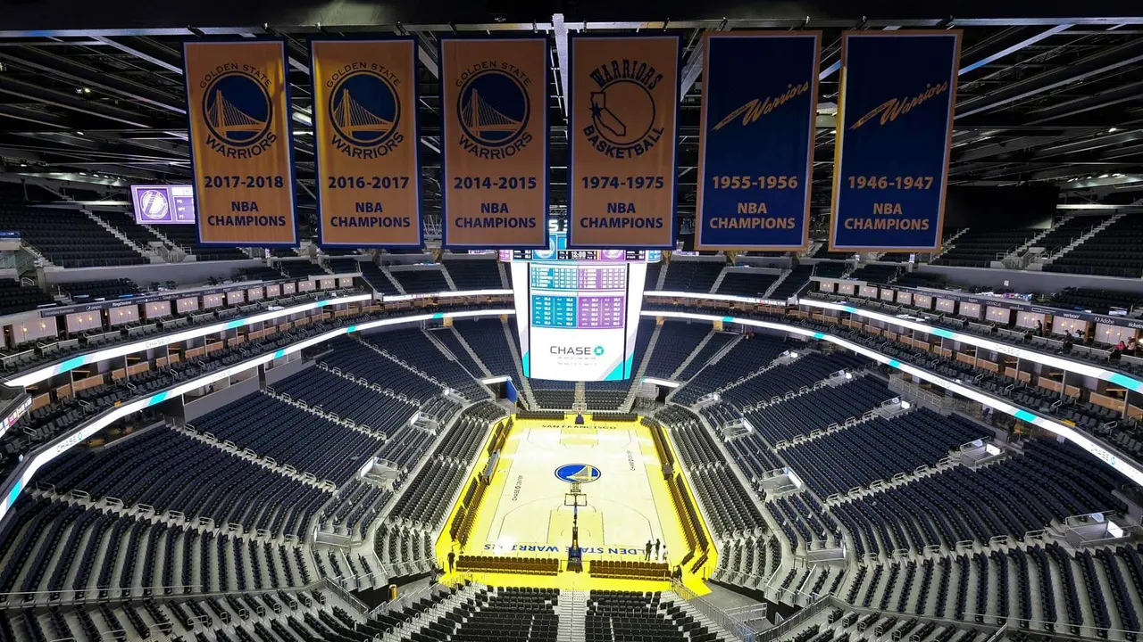 Mandatory Credit: Photo by Eric Risberg/AP/Shutterstock (10580271a)The Golden State Warriors championship banners hang above the seating and basketball court at the Chase Center in San Francisco.