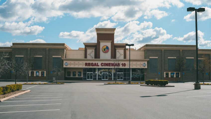 Empty movie theater parking lot.