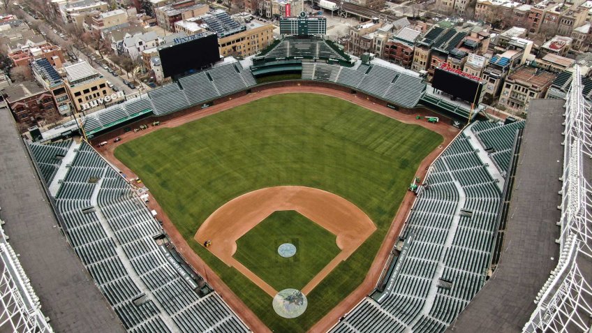 Mandatory Credit: Photo by TANNEN MAURY/EPA-EFE/Shutterstock (10594933c)An aerial photo made with a drone shows Wrigley Field, home of the Chicago Cubs baseball team, on what was supposed to be the opening day of the 2020 baseball season, in Chicago, Illinois, USA, 26 March 2020.