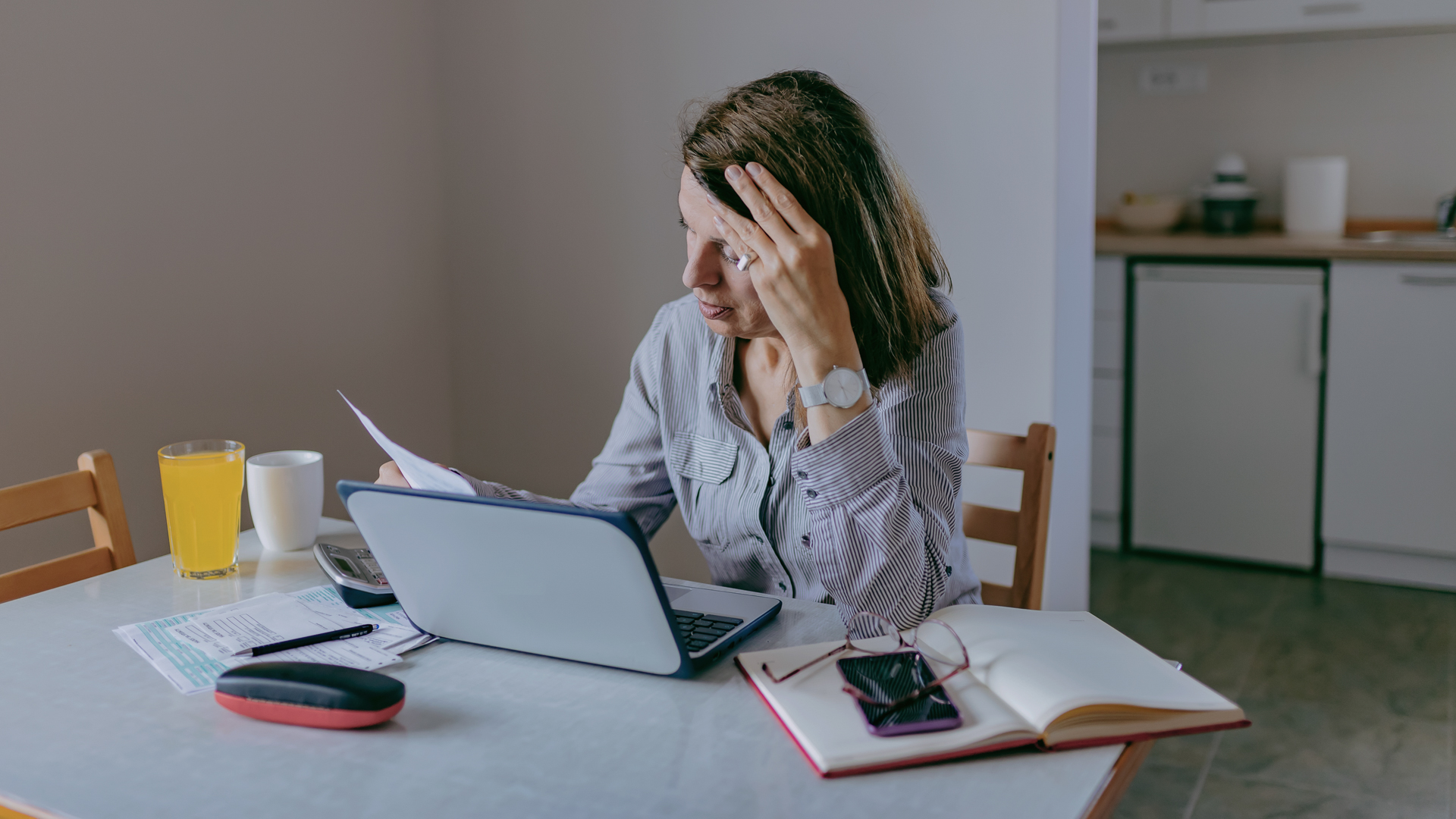 frustrated woman doing personal finances iStock 1153420421