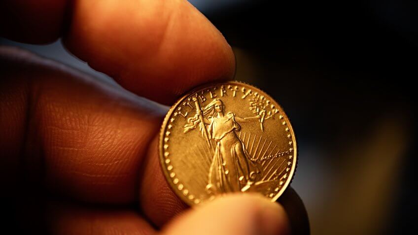 Gold coins and Gold watchband.