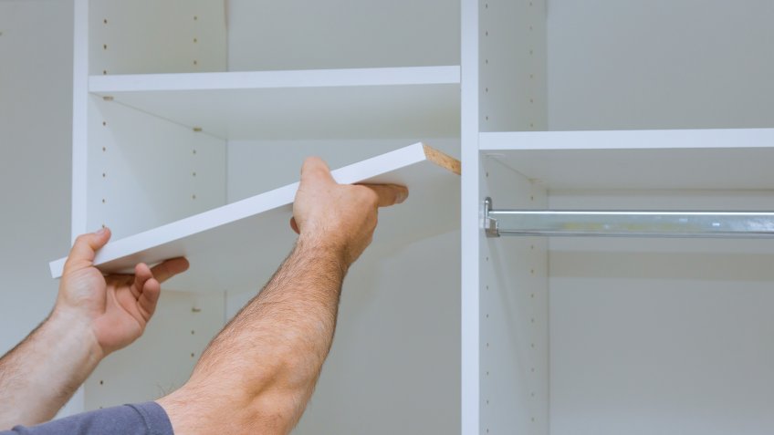 Assembling shelves for closet cabinet with home a new apartment wall installing a shelf.
