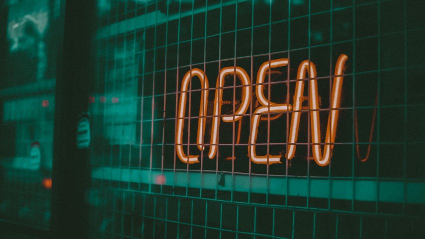 Evening, Orange light bulb, write " OPEN " in Karaoke shop.