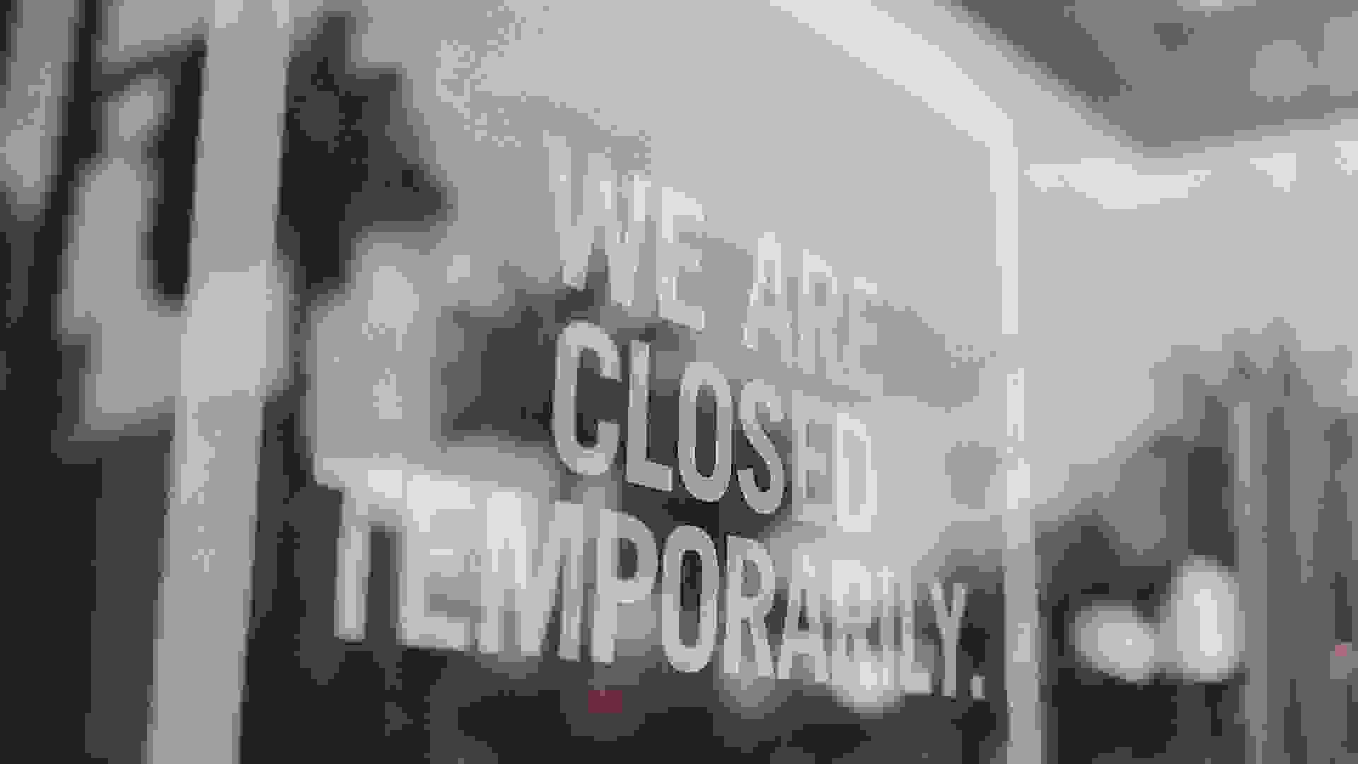 shot of store closed sign.