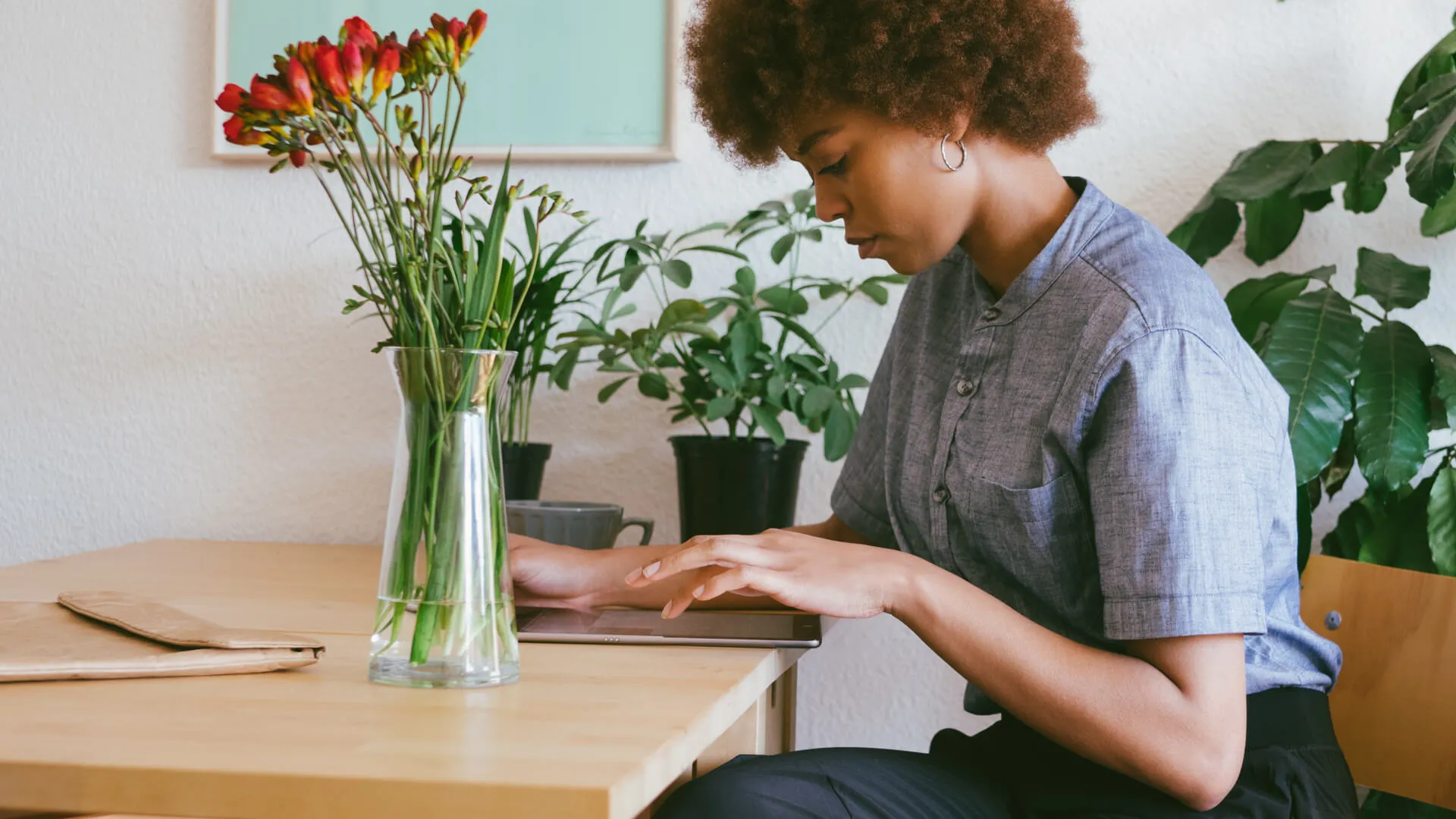 woman using her tablet working from home.