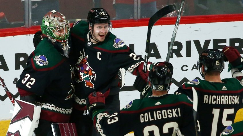Mandatory Credit: Photo by Ross D Franklin/AP/Shutterstock (10571230l)Arizona Coyotes defenseman Oliver Ekman-Larsson (23) celebrates his empty-net goal against the Buffalo Sabres with goaltender Antti Raanta (32), defenseman Alex Goligoski (33) and center Brad Richardson (15) during the third period of an NHL hockey game, in Glendale, Ariz.