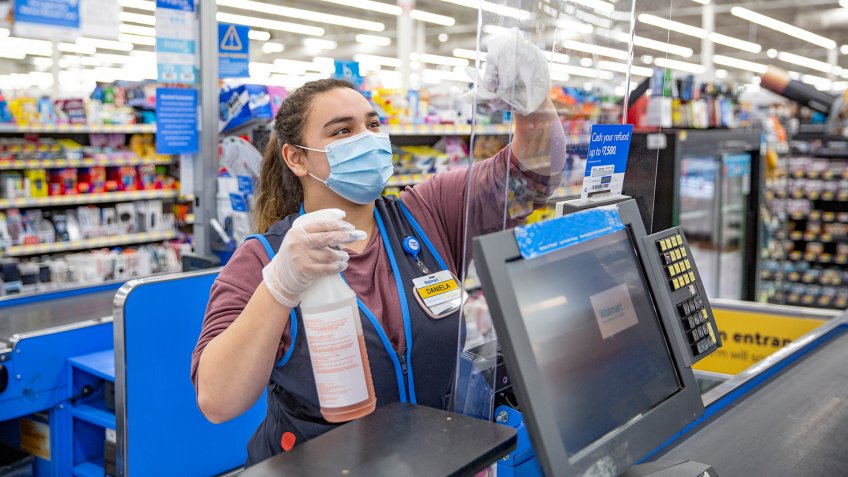 Associate Cleans Plexiglass Barrier - Walmart.