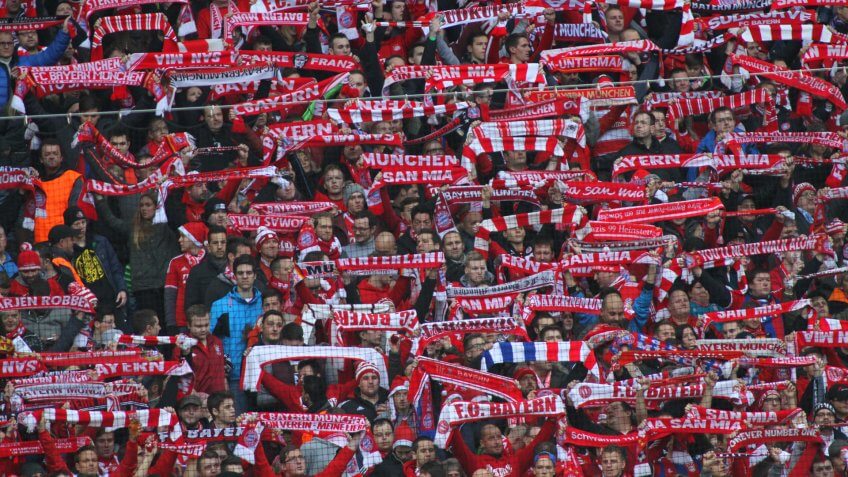 MUNICH, GERMANY - DECEMBER 12 2015: Fans during the Bundesliga match between Bayern Muenchen and FC Ingolstadt, on December 12, 2015 in Munich, Germany.
