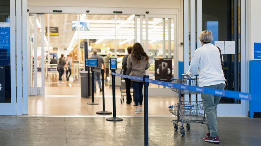 Customers Enter Walmart Store in Queue.