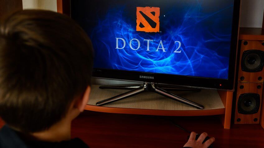 LVIV, UKRAINE - MARCH 08, 2019: Illustration of the game Dota 2, training the player before the championship in the gaming club.