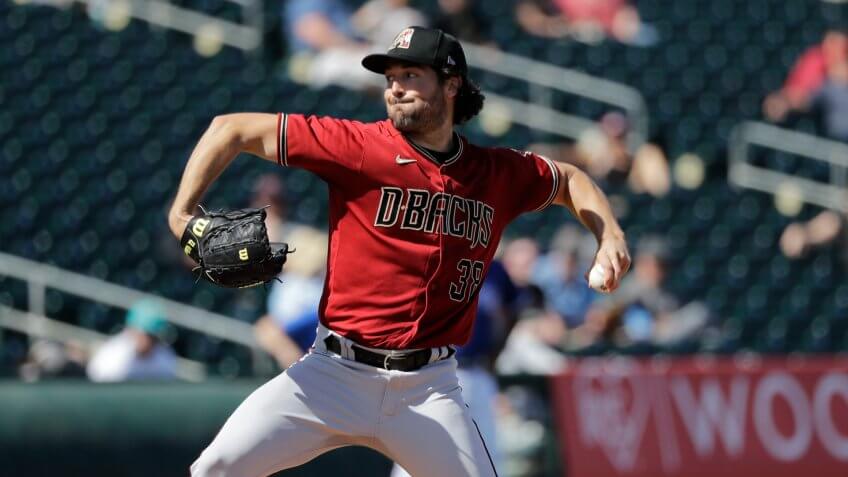 Mandatory Credit: Photo by Elaine Thompson/AP/Shutterstock (10575295s)Arizona Diamondbacks starting pitcher Robbie Ray throws against the Texas Rangers during a spring training baseball game, in Surprise, ArizDiamondbacks Rangers Spring Baseball, Surprise, USA - 05 Mar 2020.