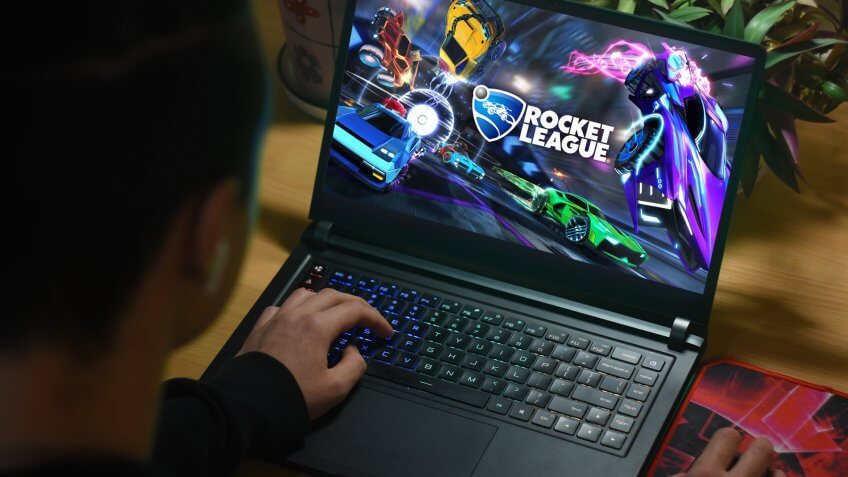 Kyiv, Ukraine; Jan 22, 2020: The guy plays on the notebook in Rocket League.