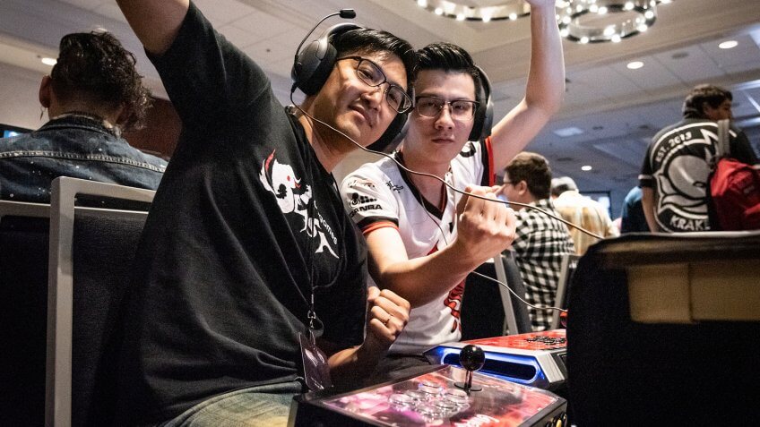 SAN JOSE, CA/USA - MARCH 30, 2019: eSports competitor Bruce “GamerBee” Hsiang versus Li-Wei “Oil King” Lin in Street Fighter V: Arcade Edition SFV match at video game tournament NCR NorCal Regionals.