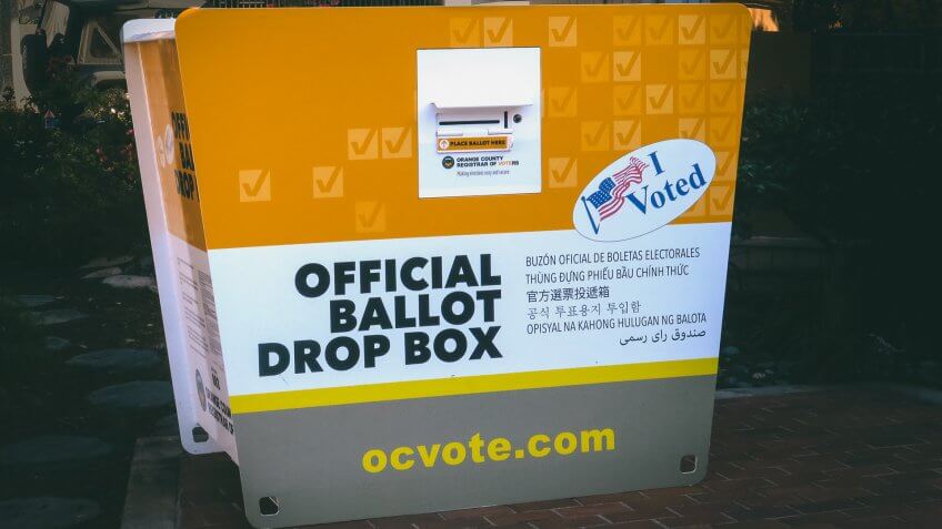 portable official ballot drop off box for the CA presidential primary, outside the library in downtown Laguna Beach, CA.