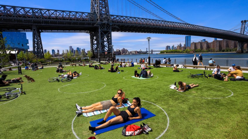 Mandatory Credit: Photo by Vanessa Carvalho/Shutterstock (10649773br)People are seen practising social distancing in white circles in Domino Park, during the Covid-19 pandemic on May 17, 2020 the in Brooklyn borough of New York City.