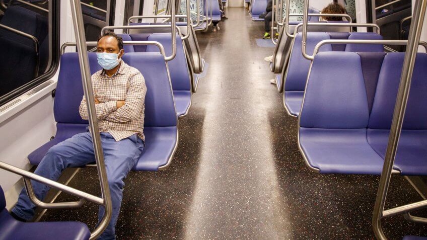 Mandatory Credit: Photo by SHAWN THEW/EPA-EFE/Shutterstock (10651949g)Metro riders on a train leaving Metro Center Station during the COVID-19 coronavirus pandemic in Washington, DC, USA, 19 May 2020.