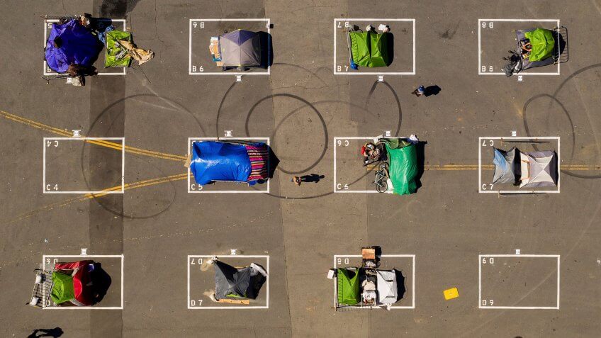 Mandatory Credit: Photo by Noah Berger/AP/Shutterstock (10654935a)Rectangles designed to help prevent the spread of the coronavirus by encouraging social distancing line a city-sanctioned homeless encampment at San Francisco's Civic Center onVirus Outbreak Homeless Encampments, San Francisco, United States - 21 May 2020.