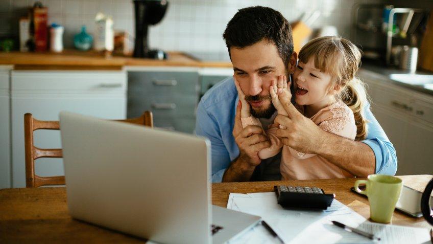 Photo of a father and daughter enjoying together.