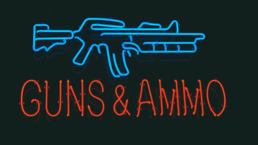 guns and ammo store sign