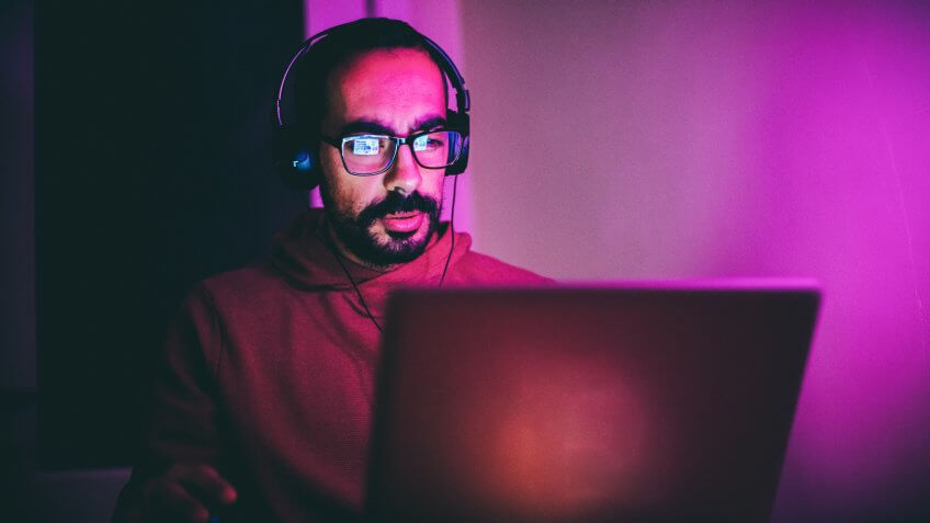 Men playing video games.