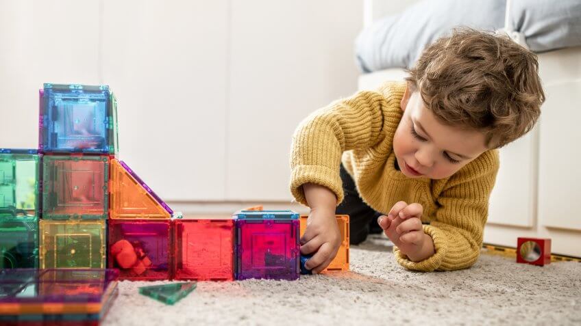 Boy playing with building Blocks.