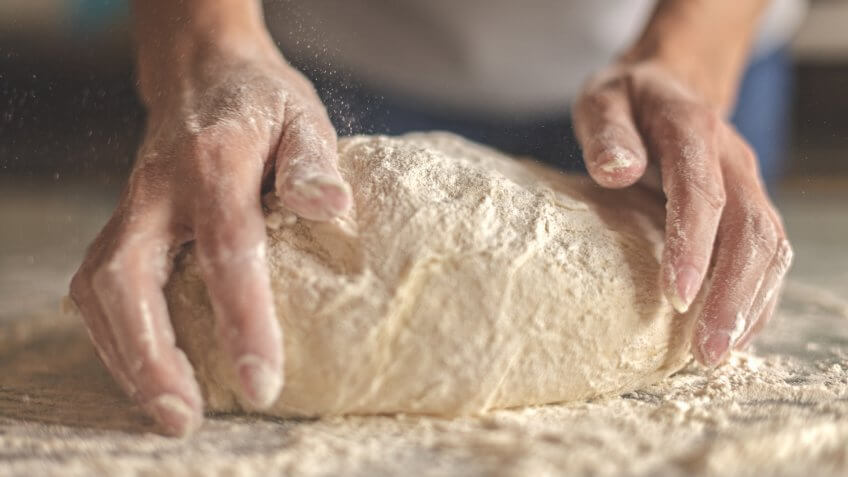 Kneading yeast dough.