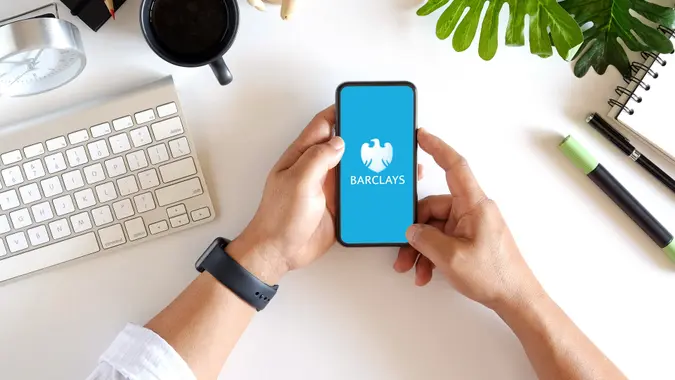 man using Barclays bank mobile app