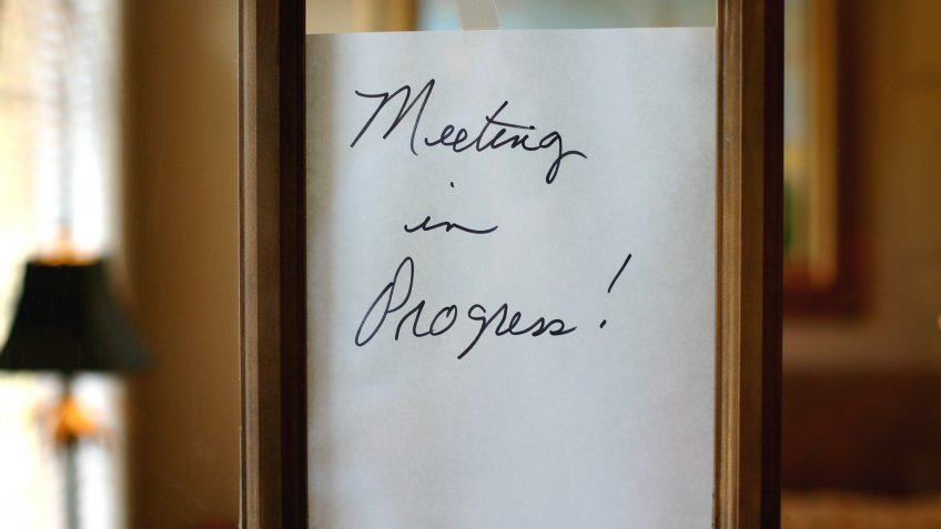 "Meeting in progress, come back later.