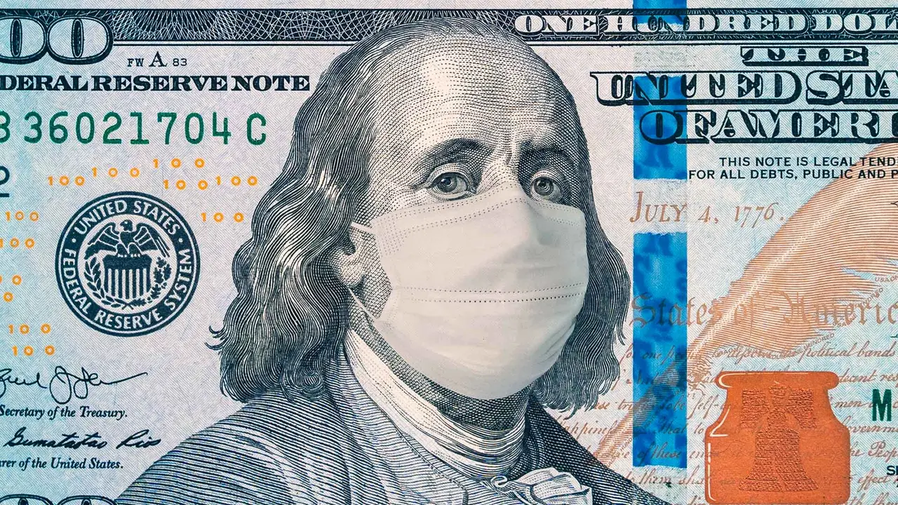 one hundred dollar bill with face mask