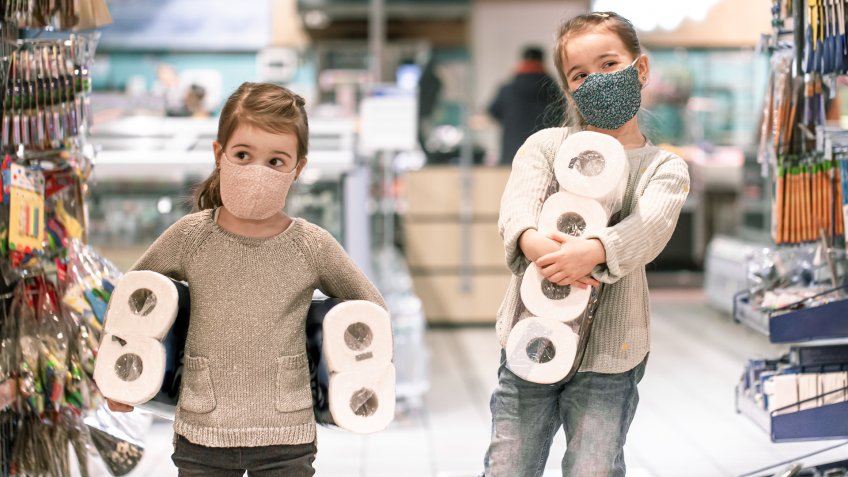 Children shopping at the supermarket during the pandemic .