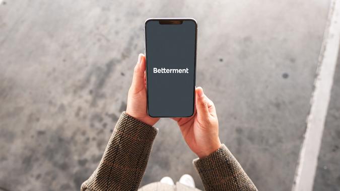 woman using Betterment Investment mobile app