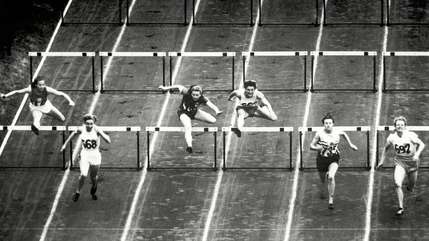 Fanny Blankers-Koen; Shirley Strickland; Maureen Gardner Dutch athlete Fanny Blankers-Koen (692) at right, wins the women's 80 meters hurdles final in world record time at the Summer Olympic Games on at Wembley Stadium in London, United Kingdom.