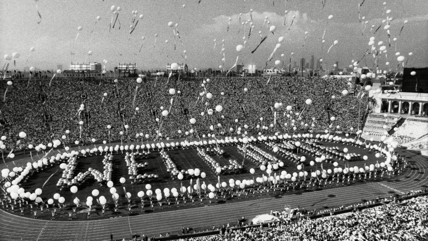 More than 1,000 five-foot helium balloons pulling colorful streamers float upward, in the Los Angeles Memorial Coliseum during opening ceremonies of the 1984 Summer Olympics1984 Olympic Opening Ceremony, Los Angeles, USA.